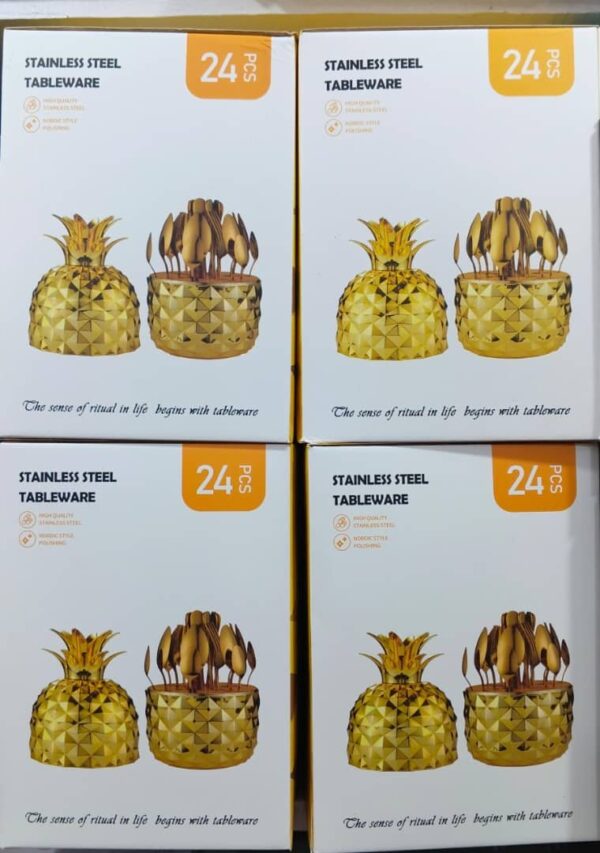 Pineapple-shaped stainless steel cutlery set.