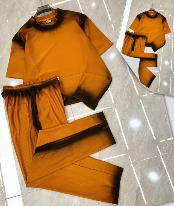 A casual loungewear set consisting of a short-sleeved top and long pants.